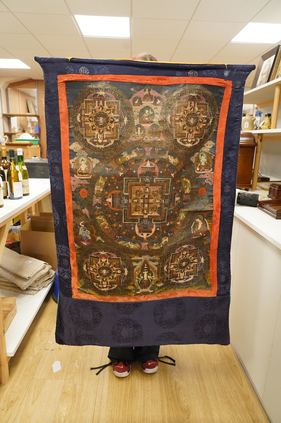 A Tibetan mandala thangka, 120 x 75cm. Condition - fair, some minor damage to the surface